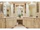 Elegant bathroom with dual sinks, vanity, and stylish fixtures, perfect for a spa-like retreat at 1312 Lookout Cir, Waxhaw, NC 28173