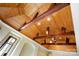 Bonus room with unique wood ceiling with beams, a ceiling fan, and windows with dark shutters at 1312 Lookout Cir, Waxhaw, NC 28173
