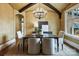 Formal dining room with hardwood floors and modern chandelier at 1312 Lookout Cir, Waxhaw, NC 28173