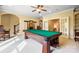 Game room with pool table and stairs, perfect for entertainment and leisure activities with friends and Gathering at 1312 Lookout Cir, Waxhaw, NC 28173