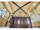 Kitchen island featuring granite countertops, custom cabinetry, and designer accents at 1312 Lookout Cir, Waxhaw, NC 28173
