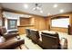 Home theater room with leather seating, projector and screen for an immersive cinematic experience at 1312 Lookout Cir, Waxhaw, NC 28173