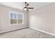 Bright bedroom featuring a ceiling fan and a large window with natural light at 137 Hunters Hill Dr, Statesville, NC 28677