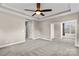 Spacious bedroom featuring trey ceiling and with windows providing natural light at 137 Hunters Hill Dr, Statesville, NC 28677