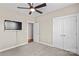 Cozy bedroom with TV, closet, neutral walls and plush carpeting at 137 Hunters Hill Dr, Statesville, NC 28677