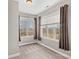 Bedroom with natural light from dual windows and neutral walls and carpeting at 137 Hunters Hill Dr, Statesville, NC 28677