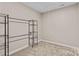 Walk-in closet with ample storage space and metal shelving at 137 Hunters Hill Dr, Statesville, NC 28677