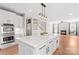 Spacious kitchen with large island, stone countertops, and stainless steel built-in appliances at 137 Hunters Hill Dr, Statesville, NC 28677