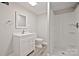 This bathroom offers a sleek vanity, modern fixtures, and a walk-in shower with contemporary finishes at 1404 Nottingham Rd, Kannapolis, NC 28081