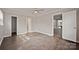 Bright bedroom with hard wood flooring, walk-in closet and bathroom at 1404 Nottingham Rd, Kannapolis, NC 28081