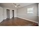 This spacious bedroom features beautiful hardwood floors, ample closet space, and a modern ceiling fan at 1404 Nottingham Rd, Kannapolis, NC 28081