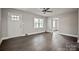 Living room featuring a window for natural light and an entrance to another room at 1404 Nottingham Rd, Kannapolis, NC 28081