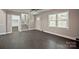 Spacious room with stairs, exterior door, and another room off to the left at 1404 Nottingham Rd, Kannapolis, NC 28081