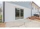 Back patio with sliding glass door and view of yard at 1404 Nottingham Rd, Kannapolis, NC 28081