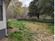 Expansive backyard offering privacy and outdoor enjoyment on a well-maintained lot at 1536 Plyler Lake Rd, Gastonia, NC 28054