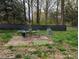 A backyard patio featuring outdoor seating and greenery for relaxation and entertaining friends and Gathering at 1536 Plyler Lake Rd, Gastonia, NC 28054
