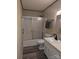 Clean bathroom featuring a shower-tub combo with sliding doors and a white vanity at 1536 Plyler Lake Rd, Gastonia, NC 28054