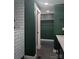 Bathroom shot showing the renovated shower and the door leading to a walk-in closet at 1536 Plyler Lake Rd, Gastonia, NC 28054