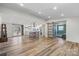 Open floor plan with luxury vinyl plank floors and ample natural light at 1536 Plyler Lake Rd, Gastonia, NC 28054