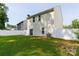 Well-maintained backyard with a lush green lawn and a white privacy fence, perfect for outdoor enjoyment at 1953 Boulder Ct, Gastonia, NC 28054