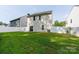 Well-maintained backyard with a lush green lawn and a white privacy fence, perfect for outdoor enjoyment at 1953 Boulder Ct, Gastonia, NC 28054