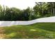 Expansive backyard features a well-maintained white fence, offering privacy and security to the property at 1953 Boulder Ct, Gastonia, NC 28054