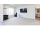 Spacious bedroom with neutral carpet, a TV mounted on the wall, and lots of natural light at 1953 Boulder Ct, Gastonia, NC 28054