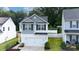 Charming two-story home with a well-manicured lawn, a two-car garage, and beautiful curb appeal at 1953 Boulder Ct, Gastonia, NC 28054