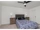Bedroom with neutral carpet, ceiling fan, and two side tables with lamps at 2004 Crooked Oak Ln, York, SC 29745