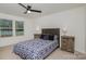 Inviting bedroom featuring a ceiling fan, natural light, and modern furnishings, creating a relaxing space at 2004 Crooked Oak Ln, York, SC 29745