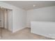 Bonus room featuring neutral carpet and paint and door to a closet at 2004 Crooked Oak Ln, York, SC 29745