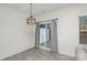 Bright dining area with a sliding glass door and a stylish light fixture at 2004 Crooked Oak Ln, York, SC 29745