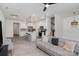 Spacious living room boasts wood-look flooring and seamlessly connects to the kitchen area at 2004 Crooked Oak Ln, York, SC 29745