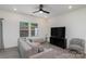 Inviting living room with a large window, comfortable seating, and a sleek entertainment center at 2004 Crooked Oak Ln, York, SC 29745