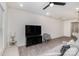 Well-lit living area with a ceiling fan, recessed lighting, and an open layout connecting to the kitchen at 2004 Crooked Oak Ln, York, SC 29745