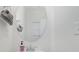 Cozy powder room featuring a round mirror and modern fixtures in a bright, minimalist design at 2004 Crooked Oak Ln, York, SC 29745