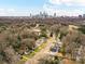 Panoramic aerial view of the neighborhood with the city skyline in the distance at 2615 Brentwood Pl, Charlotte, NC 28208