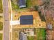 Aerial view of the home shows the new construction, large lot, and outdoor living space at 2615 Brentwood Pl, Charlotte, NC 28208