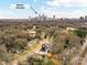 Great aerial view of the neighborhood with Uptown Charlotte clearly visible in the distance at 2615 Brentwood Pl, Charlotte, NC 28208