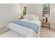 Serene bedroom featuring ample natural light, neutral tones, and comfortable furnishings at 2615 Brentwood Pl, Charlotte, NC 28208