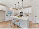 Modern kitchen features white cabinets, quartz countertops and stainless steel appliances at 2615 Brentwood Pl, Charlotte, NC 28208