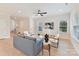 Airy living room with a modern ceiling fan, stylish furniture, and plenty of natural light at 2615 Brentwood Pl, Charlotte, NC 28208