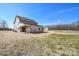 Large backyard featuring an expansive lawn and wooded tree line at 2622 Old Camden Rd, Monroe, NC 28110