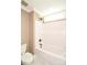 Bathroom with white tub and shower combo, a marble-look vanity, and framed mirror at 2622 Old Camden Rd, Monroe, NC 28110