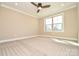 Bedroom featuring neutral walls, carpet flooring, and a window for bright natural light at 2622 Old Camden Rd, Monroe, NC 28110