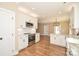 Modern kitchen featuring white cabinets, stainless steel appliances, and granite countertops at 2622 Old Camden Rd, Monroe, NC 28110