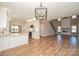 Spacious living room features a modern fireplace, high ceilings, and an open floor plan to the kitchen at 2622 Old Camden Rd, Monroe, NC 28110