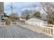 A view of the backyard and the large two-car garage at 305 Flat Rock St, Clover, SC 29710