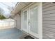 This back porch with double doors offers a private and quiet space to sit and relax at 305 Flat Rock St, Clover, SC 29710