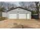 Large detached two-car garage with room for storage and parking at 305 Flat Rock St, Clover, SC 29710